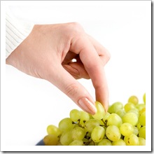 Grape with hand
